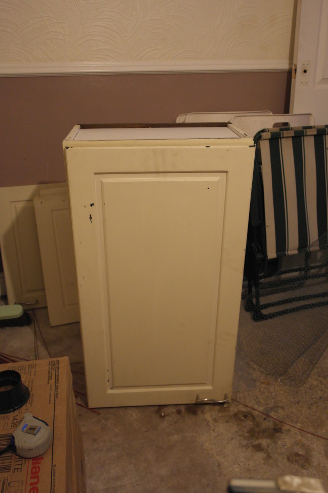 The single wall cabinet before I painted it
