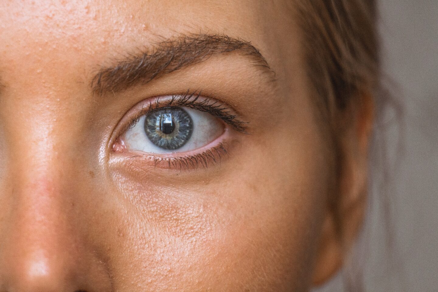 close up image of woman's face focussing on eye