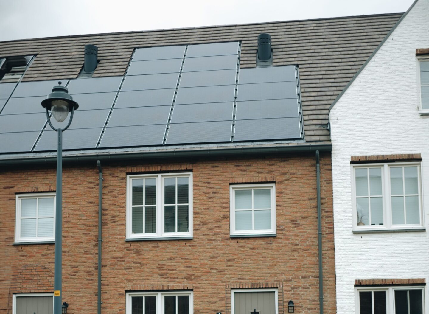 Solar panels installed on the roof of a modern home to generate renewable electricity and improve energy efficiency.
